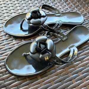 CHANEL Black Camellia Jelly Thong Sandals with Gold Logo